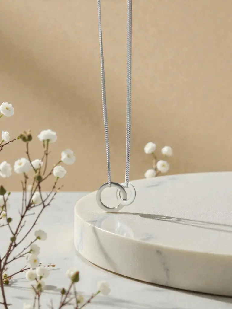 Silver two circle pendant for woman 2.webp