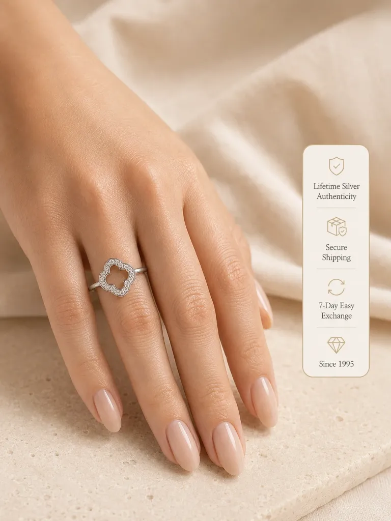 silver-clover-ring-on-hand.webp.webp
